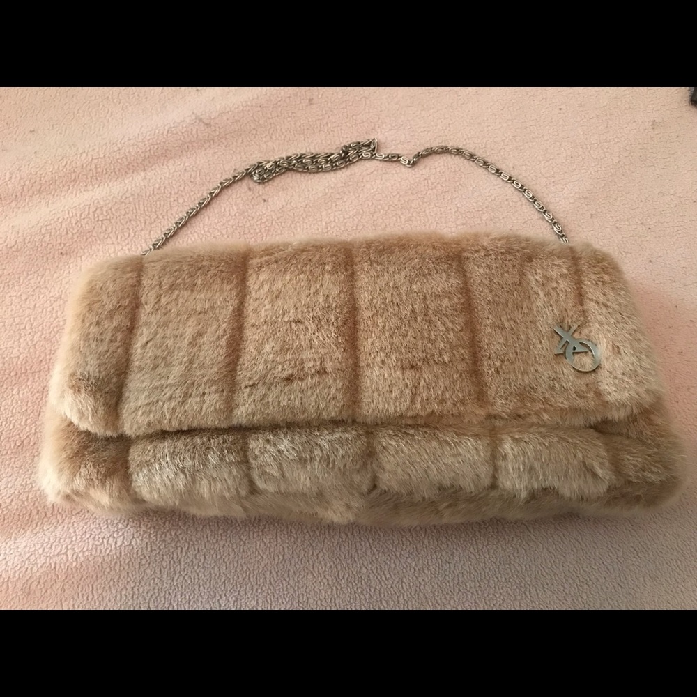 Fur like beige clutch
